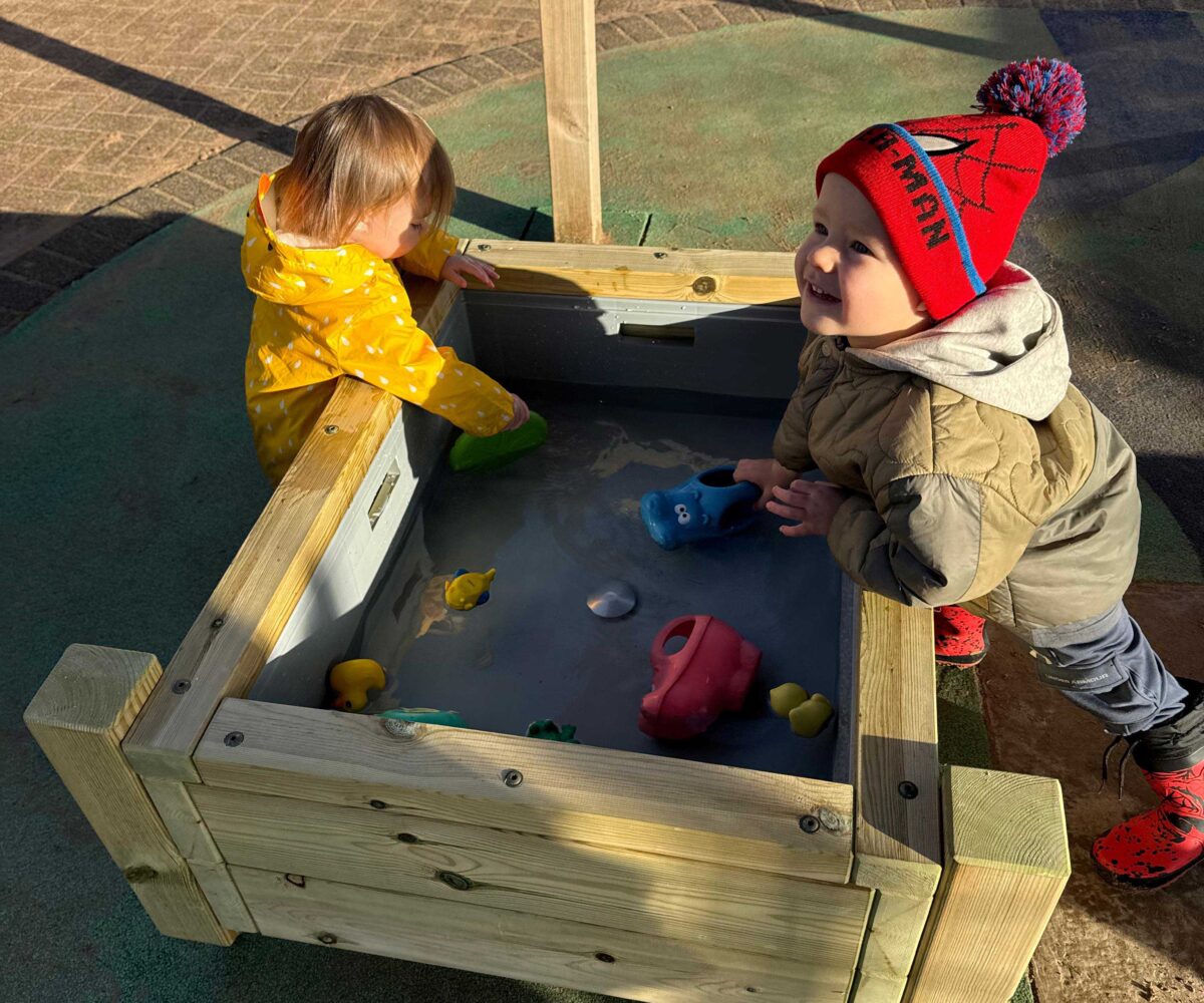 Water tray being tested by product testers portrait